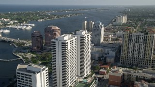AX0032_096E - 5K aerial stock footage of approaching Trump Plaza, West Palm Beach, Florida