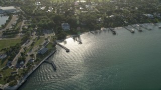 AX0032_158 - 5K aerial stock footage of approaching house by Sandspirit Park, Stuart, Florida