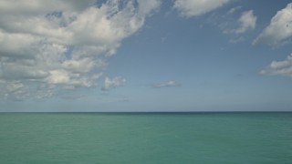 AX0033_033 - 5K aerial stock footage of a view of the ocean from Fort Pierce, Florida