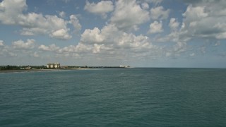 AX0033_038 - 5K aerial stock footage fly over blue ocean waters near the coast, Fort Pierce, Florida