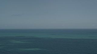 AX0033_053 - 5K aerial stock footage of the blue ocean seen from Vero Beach, Florida