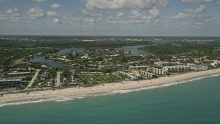 AX0033_063 - 5K aerial stock footage fly by beachside condominiums, Vero Beach, Florida
