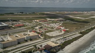 AX0034_001 - 5K aerial stock footage fly by Patrick Air Force Base, Florida