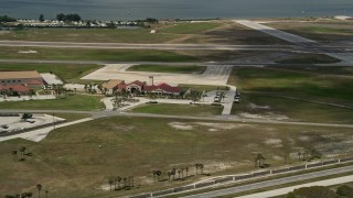 AX0034_002 - 5K aerial stock footage flyby buildings at Patrick Air Force Base, Central Florida