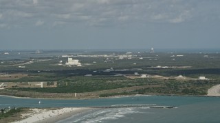 AX0034_013 - 5K aerial stock footage of approaching Cape Canaveral, Florida