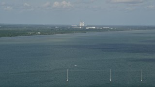 AX0034_022 - 5K aerial stock footage of Cape Canaveral seen from across Banana River, Florida