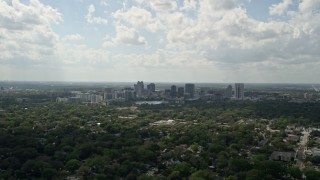 AX0035_001 - 5K aerial stock footage of Downtown Orlando skyline seen from a distance, Florida