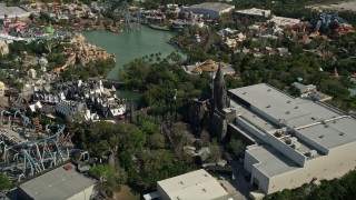 AX0035_017 - 5K stock footage aerial video of Wizarding World of Harry Potter, Universal Studios, Orlando, Florida