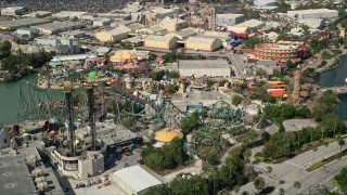 AX0035_021 - 5K stock footage aerial video of of Incredible Hulk Coaster at Universal Studios theme park, Orlando, Florida