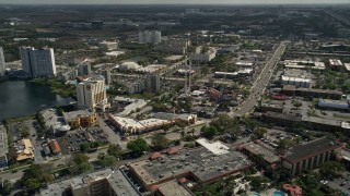 AX0035_025E - 5K aerial stock footage of Magical Midway theme park, Orlando, Florida