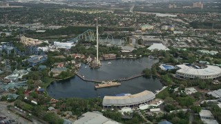 AX0035_029E - 5K aerial stock footage of flying by Seaworld Orlando, Florida