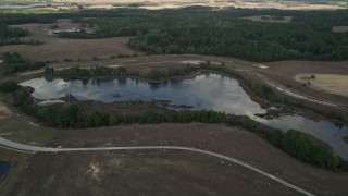 AX0035_087 - 5K aerial stock footage approach a small lake in Clermont, Florida
