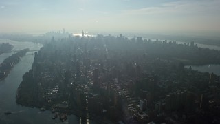 AX0065_0043 - 5K aerial stock footage of a view of Midtown Manhattan seen from the Upper East Side, New York City, winter