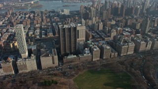 AX0065_0055 - 5K aerial stock footage flyby Mount Sinai Hospital and apartment buildings, Upper East Side, New York City, winter