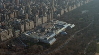 AX0065_0056 - 5K aerial stock footage of approaching the Metropolitan Museum of Art in New York City, winter