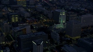 AX0156_046 - 7.6K aerial stock footage of City Hall and city government buildings in Downtown Los Angeles at sunrise, California