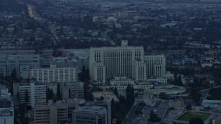 AX0156_091E - 7.6K aerial stock footage of General Hospital at USC Health Sciences Campus in Boyle Heights, Los Angeles, California at sunrise