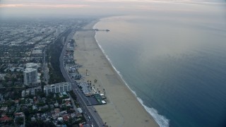 AX0156_144E - 7.6K aerial stock footage flying over residential toward beach and Pacific Ocean, Santa Monica Pier, Santa Monica, California