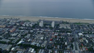 AX0156_151 - 7.6K aerial stock footage of Ocean Park area of Santa Monica at sunrise, California