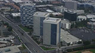 AX0156_198 - 7.6K aerial stock footage flying past office buildings in El Segundo, California in the morning 