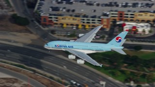 AX0157_007 - 7.6K stock footage aerial video of Korean Air A380 landing at LAX, Los Angeles, California