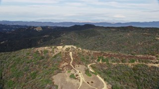 AX0157_018E - 7.6K aerial stock footage flying over the Santa Monica Mountains in California