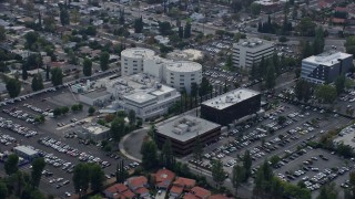 AX0157_032E - 7.6K aerial stock footage of West Hills Hospital complex in West Hills, California