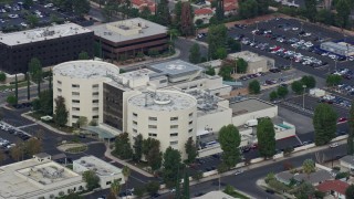AX0157_035 - 7.6K aerial stock footage of West Hills Hospital in West Hills, California