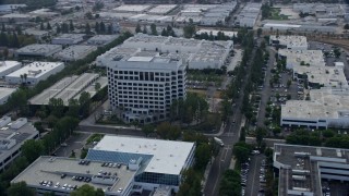 AX0157_058 - 7.6K aerial stock footage of an office building in Chatsworth, California