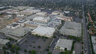 AX0157_059E - 7.6K aerial stock footage orbiting Macy's and Northridge Shopping Mall in Northridge, California