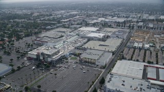 AX0157_061E - 7.6K aerial stock footage orbiting near the Northridge Shopping Mall in Northridge, California
