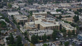 AX0157_067E - 7.6K aerial stock footage of an orbit around Northridge Hospital in Northridge, California