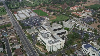 AX0157_079 - 7.6K aerial stock footage of Providence Holy Cross Medical Center in Mission Hills, California