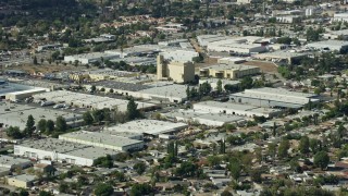 AX0159_005 - 7.6K stock footage aerial video of warehouses, San Fernando Valley, Sylmar, California