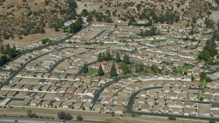 AX0159_007 - 7.6K aerial stock footage of a manufactured Home Community, Sylmar, San Fernando Valley, California