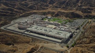 AX0159_043 - 7.6K stock footage aerial video of a supermax correctional facility, Pitchess Detention Center, Valencia, California