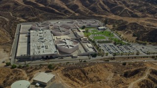 AX0159_044 - 7.6K stock footage aerial video of the supermax facility at a prison, Valencia, California