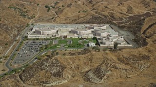 AX0159_045 - 7.6K stock footage aerial video of a detention facility, Valencia, California