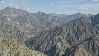 AX0159_059 - 7.6K aerial stock footage revealing canyon and mountain ridges, Sunland-Tujunga, California