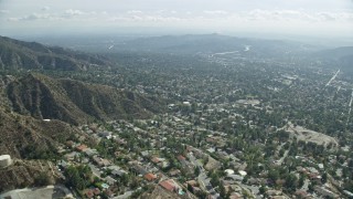 AX0159_062 - 7.6K aerial stock footage flying over residential neighborhoods, Tujunga, California