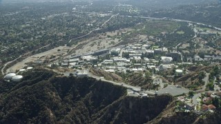 AX0159_067E - 7.6K aerial stock footage orbiting research buildings on the JPL campus, Pasadena, California