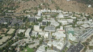 AX0159_070 - 7.6K aerial stock footage of reverse orbit of the Jet Propulsion Laboratory campus, Pasadena, California