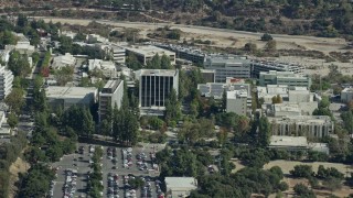AX0159_078E - 7.6K aerial stock footage close up orbiting of research and development buildings on JPL campus, Pasadena, California