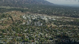 AX0159_085E - 7.6K aerial stock footage tilting down to bird's eye of buildings on the JPL campus, Pasadena, California