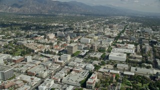 AX0159_095E - 7.6K aerial stock footage orbiting away from City Hall and businesses, Pasadena, California