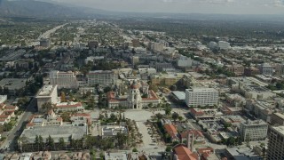 AX0159_106 - 7.6K stock footage aerial video flying over Pasadena City Hall and office buildings in Pasadena, California