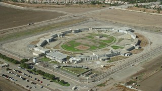 AX0159_149 - 7.6K stock footage aerial video of East Yard of the California Institution for Men, Chino, California