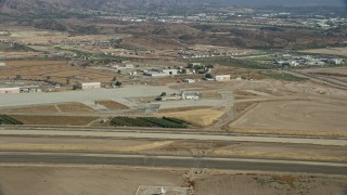 AX0159_166 - 7.6K aerial stock footage of an abandoned airport, Irvine, California
