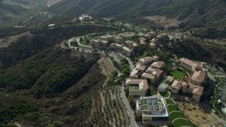 AX0159_181 - 7.6K aerial stock footage of Soka University of America in the hills of Aliso Viejo, California