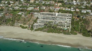 AX0159_206 - 7.6K aerial stock footage of Laguna Royale Condominiums and West Street Beach in Laguna Beach, California